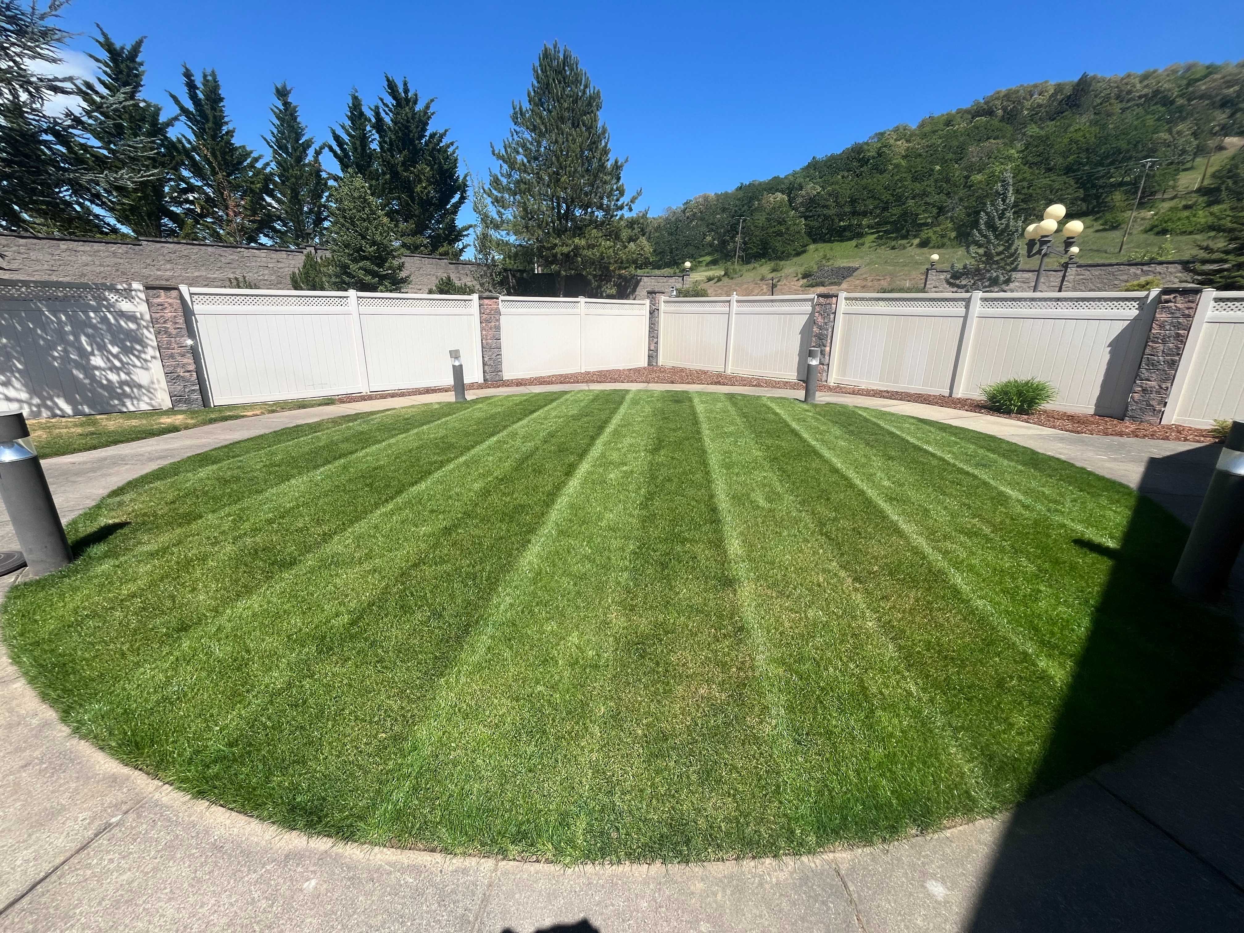 Peridot Landscaping team maintaining a commercial property in Roseburg Oregon